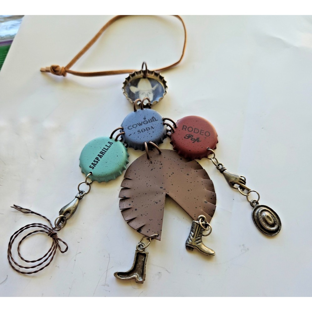 Cowgirl Dangle.  Hang on rear view mirror, on your purse or wherever